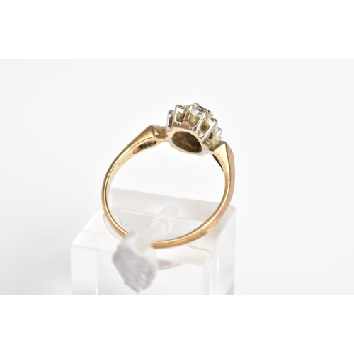 9 - A 9CT GOLD SAPPHIRE AND DIAMOND CLUSTER RING, set with a central oval cut sapphire within a single c... 