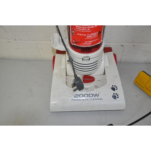 1128 - A HOOVER HURRICANE 2000W vacuum cleaner, and an Electrolux superbroom vacuum cleaner (2)
