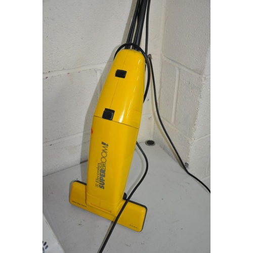 1128 - A HOOVER HURRICANE 2000W vacuum cleaner, and an Electrolux superbroom vacuum cleaner (2)