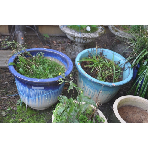 1011 - SIX GLAZED GARDEN PLANT POTS the largest being 50cm in diameter and 40cm high and a small water feat... 