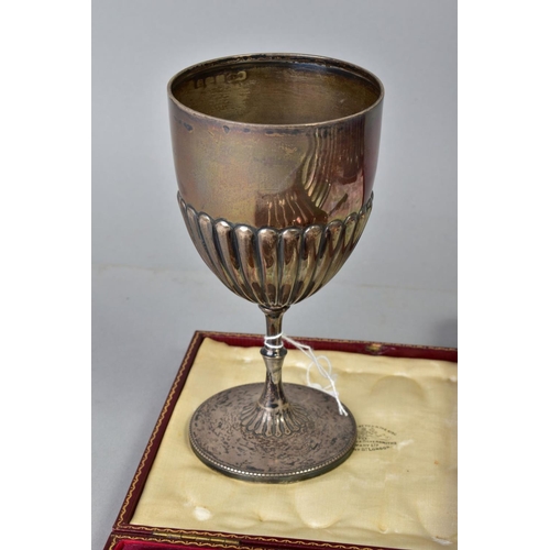 108 - AN EDWARDIAN SILVER TROPHY CUP, stop reeded decoration, slender stem with soldered repair, circular ... 