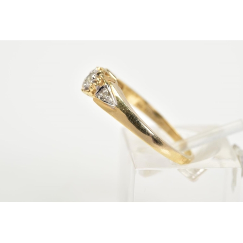 11 - A 9CT GOLD DIAMOND RING, designed with a central illusion set brilliant cut diamond with single cut ... 