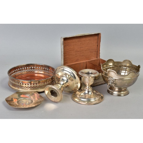 111 - A PARCEL OF SILVER, including a pair of dwarf candlesticks, circular loaded bases, one damaged to st... 