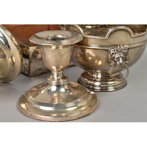 111 - A PARCEL OF SILVER, including a pair of dwarf candlesticks, circular loaded bases, one damaged to st... 