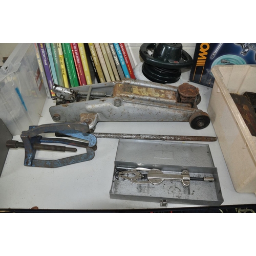 1113 - A COLLECTION OF AUTOMOTIVE TOOLS AND LITERATURE including a Trolley Jack, Hub Puller, Paintwork poli... 