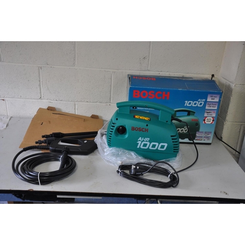 1125 - A BRAND NEW IN BOX BOSCH AHR1000 PRESSURE WASHER with all unused parts (PAT no required)