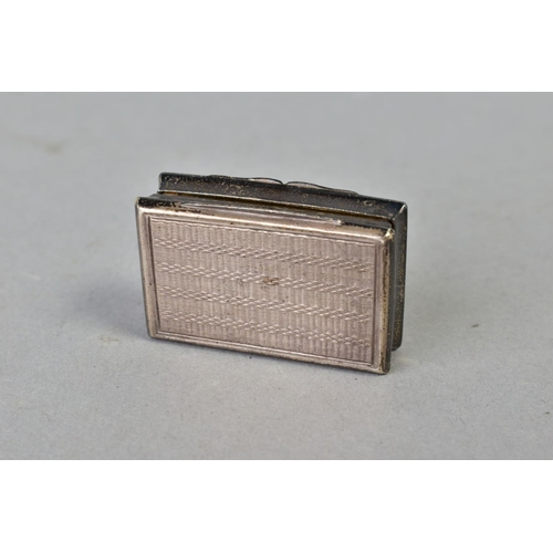 113 - A GEORGE VI SILVER VINAIGRETTE, of rectangular form, engraved 'Harry' to the engine turned cover, th... 