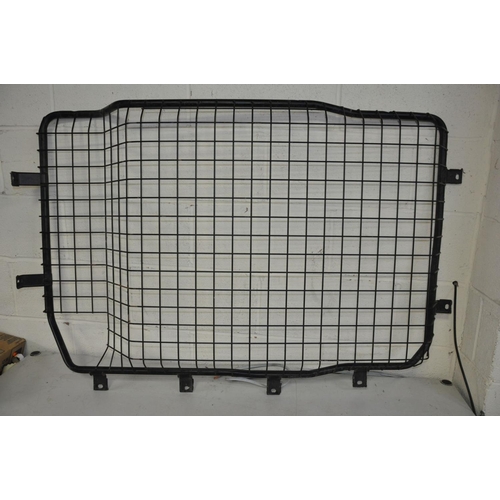 1132 - A FORD TRANSIT SHEET STEEL BULKHEAD, width 175cm x height 138cm (some corners and panel dents) and a... 