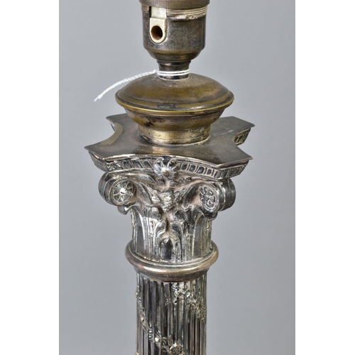 118 - A PAIR OF EARLY 20TH CENTURY SILVER PLATED TABLE LAMPS, of Corinthian column form, the fluted column... 