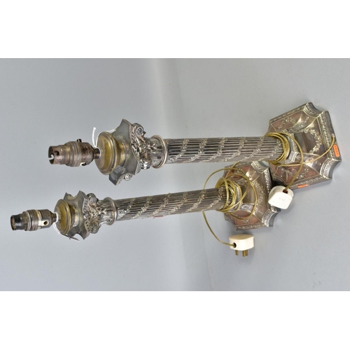 118 - A PAIR OF EARLY 20TH CENTURY SILVER PLATED TABLE LAMPS, of Corinthian column form, the fluted column... 