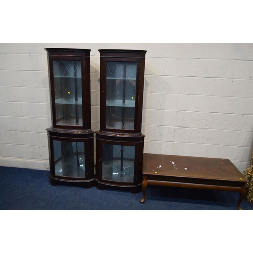 1206 - TWO MODERN MAHOGANY GLAZED SINGLE DOOR CORNER CUPBOARDS together with a modern mahogany coffee table... 