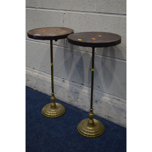 1211 - A PAIR OF EARLY TO MID 20TH CENTURY BRASS AND CIRCULAR OAK TOPPED PLANT STANDS, diameter 25cm x heig... 