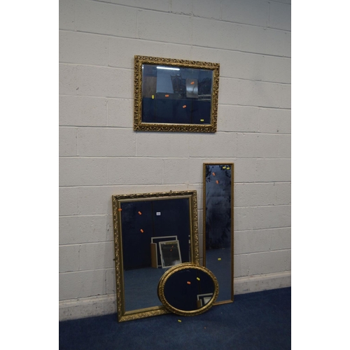 1213 - A MODERN GILT WOOD BEVELLED EDGE WALL MIRROR, 71cm x 101cm together with a heavily gilt framed bevel... 