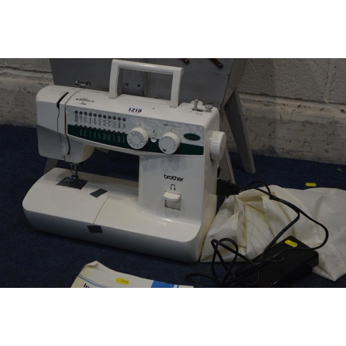 1219 - A BROTHER XL-5031 SEWING MACHINE with manual, cover and pedal (PAT pass and working) together with a... 