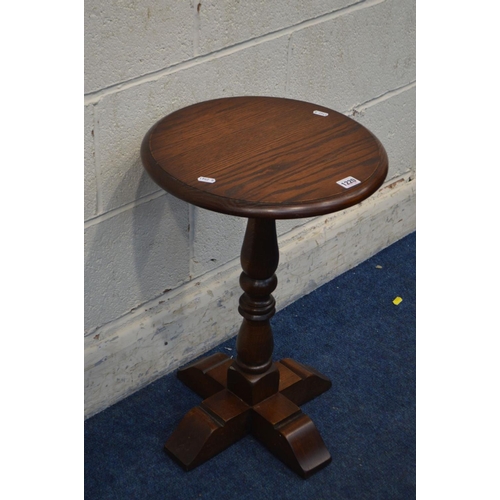 1220 - AN OLD CHARM OAK CIRCULAR TOPPED LAMP TABLE, diameter 38cm x height 57cm