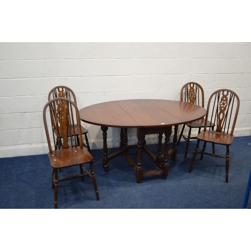 1224 - AN OLD CHARM OAK OVAL TOPPED GATE LEG TABLE, extended length 153cm x closed length 50cm x depth 114c... 