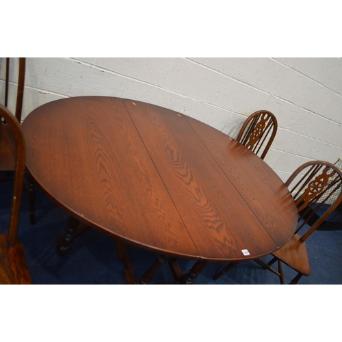 1224 - AN OLD CHARM OAK OVAL TOPPED GATE LEG TABLE, extended length 153cm x closed length 50cm x depth 114c... 