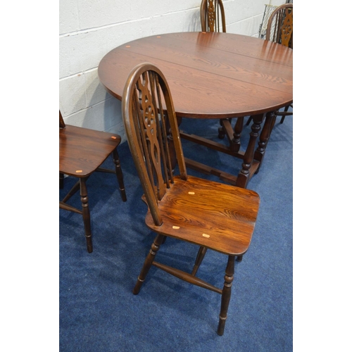 1224 - AN OLD CHARM OAK OVAL TOPPED GATE LEG TABLE, extended length 153cm x closed length 50cm x depth 114c... 