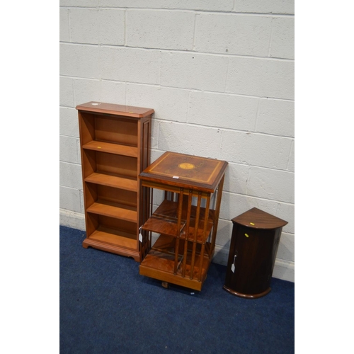 1233 - A MODERN YEWWOOD TWO TIER REVOLVING BOOKCASE, together with a yewwood open bookcase and a small maho... 