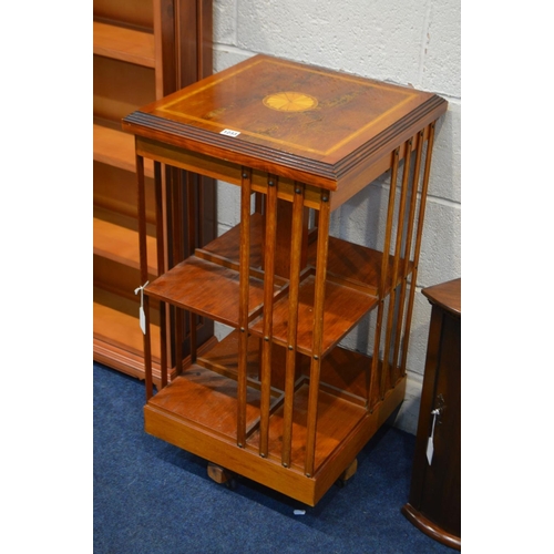 1233 - A MODERN YEWWOOD TWO TIER REVOLVING BOOKCASE, together with a yewwood open bookcase and a small maho... 