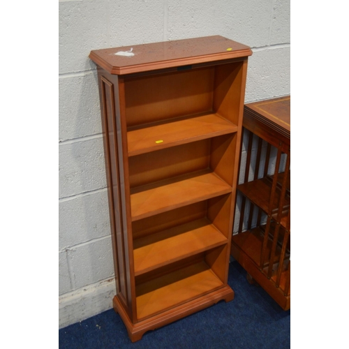 1233 - A MODERN YEWWOOD TWO TIER REVOLVING BOOKCASE, together with a yewwood open bookcase and a small maho... 