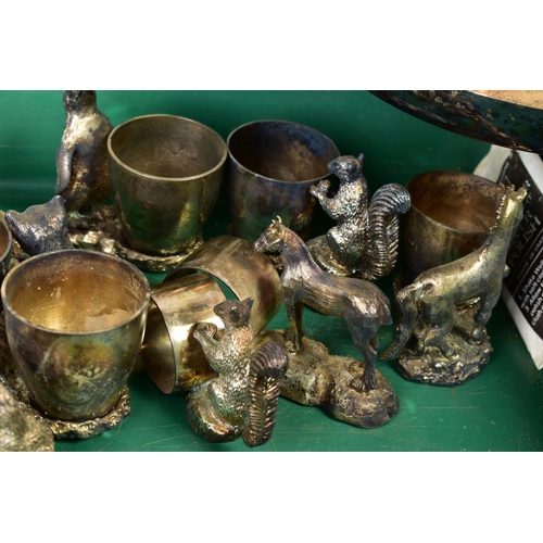 124 - A GROUP OF SILVER PLATED EGG CUPS, NAPKIN RINGS AND NUT DISHES, each with a cast bird or animal, inc... 