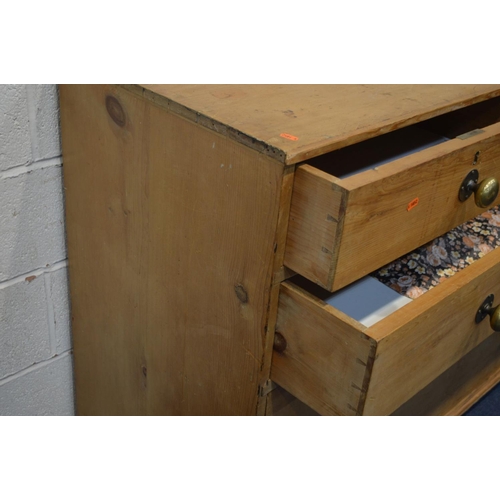 1241 - A 19TH CENTURY PINE CHEST OF TWO SHORT OVER THREE LONG DRAWERS, with turned brass handles on bracket... 