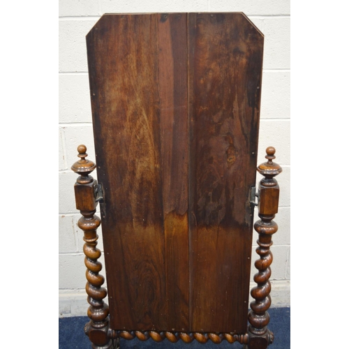 1242 - A LATE VICTORIAN WALNUT CHEVAL MIRROR, with canted top corners, supported on twin supports with turn... 