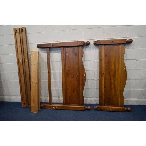 1247 - A PINE DOUBLE BED FRAME with head and foot boards, side rails and seven slats, all fixing appear to ... 