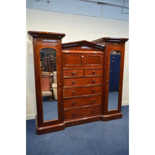 1255 - A VICTORIAN MAHOGANY COMPACTUM TRIPLE SECTION WARDROBE, the two outer sections with individual corni... 