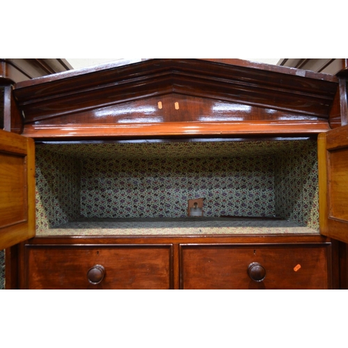 1255 - A VICTORIAN MAHOGANY COMPACTUM TRIPLE SECTION WARDROBE, the two outer sections with individual corni... 