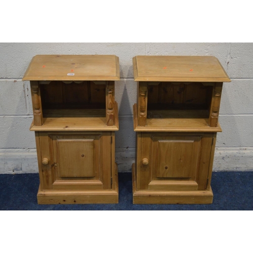 1256 - A PAIR OF PINE BEDSIDE CABINETS with single cupboard doors, width 46cm x depth 32cm x height 76cm