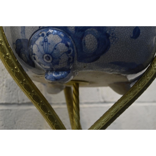 1259 - A LATE 20TH CENTURY ORIENTAL STYLE CRACKLE GLAZE BLUE AND WHITE POTTERY JARDINIERE, on a seperate br... 