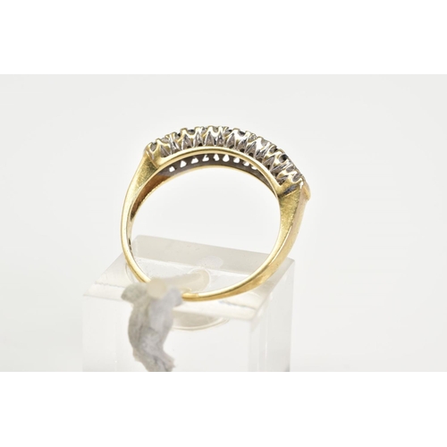 126 - A 9CT GOLD SAPPHIRE AND DIAMOND HALF HOOP RING, set with three circular cut sapphires, interspaced w... 