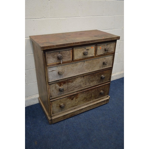 1261 - A DISTRESSED WALNUT CHEST OF THREE SHORT OVER THREE LONG DRAWERS, with turned handles, width 106cm x... 