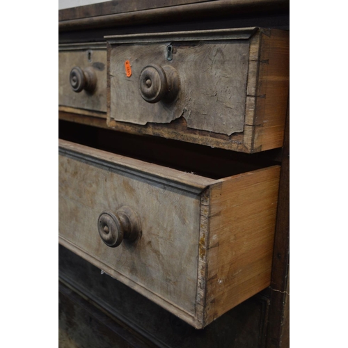 1261 - A DISTRESSED WALNUT CHEST OF THREE SHORT OVER THREE LONG DRAWERS, with turned handles, width 106cm x... 