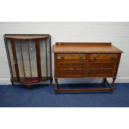 1268 - AN EARLY 20TH CENTURY OAK BARLEY TWIST SIDEBOARD, with a riased back and pie crust edging above two ... 