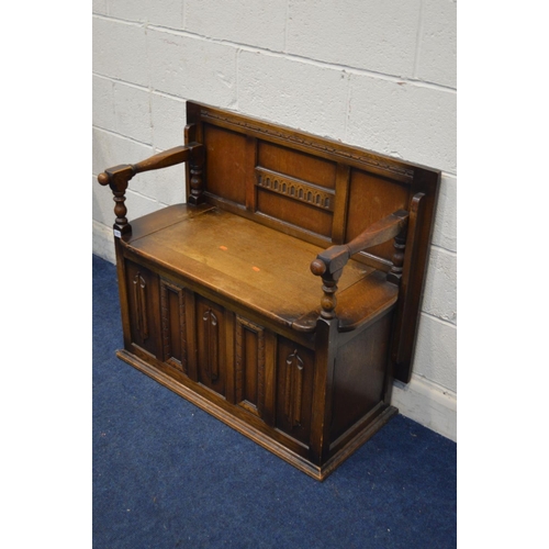 1277 - A MID 20TH CENTURY OAK LINENFOLD MONKS BENCH, width 99cm x depth 71cm x height 75cm