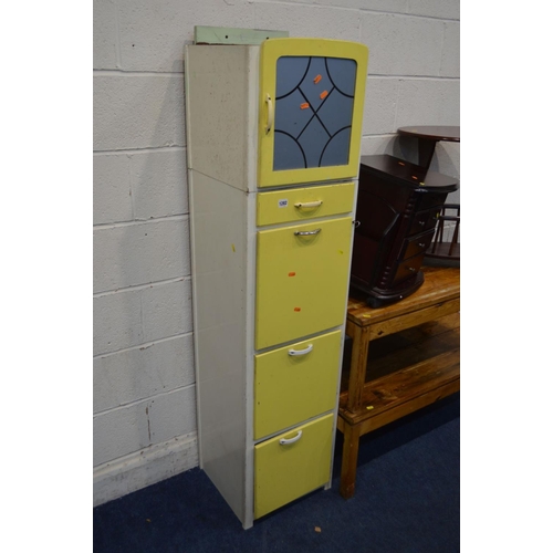 1282 - A TALL SLIM YELLOW PAINTED KITCHEN CABINET, together with two pitch pine coffee tables and two magaz... 