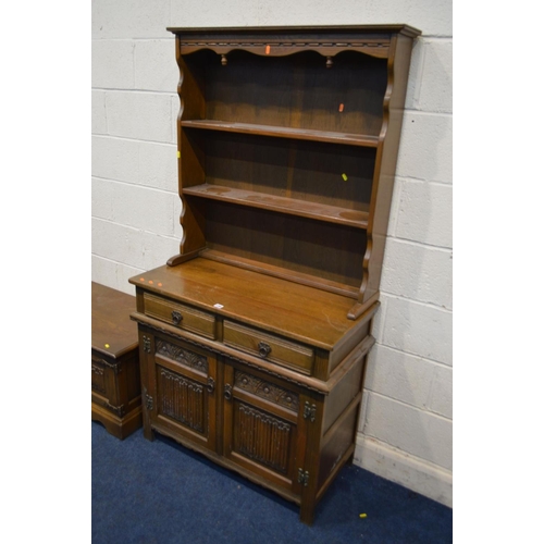 1290 - AN OLD CHARM OAK LINENFOLD DRESSER, with two drawers, width 93cm x depth 44cm x height 176cm and a t... 