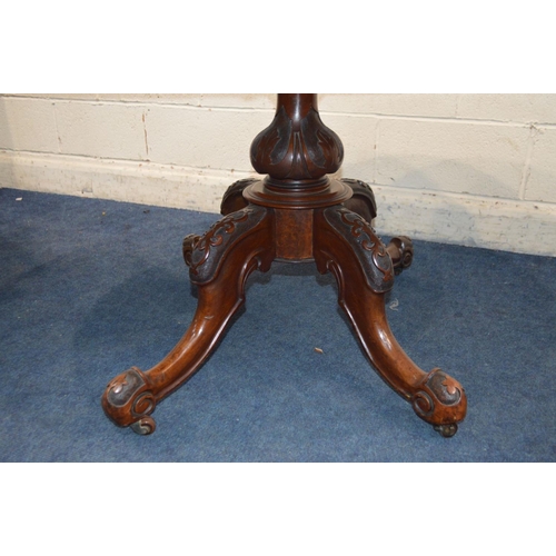 1294 - A LATE VICTORIAN BURR WALNUT OVAL TOPPED LOO TABLE, the tilt top on four legged  base, length 143cm ... 