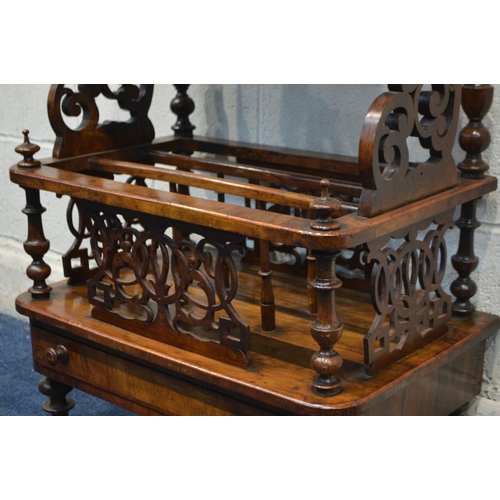 1295 - A VICTORIAN BURR WALNUT CANTERBURY, having a gallery top, on a pair of foliate scrolling and turned ... 