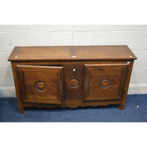 1301 - A LOW EARLY 20TH CENTURY OAK AND STRUNG INLAID FRENCH TWO DOOR CABINET, width 124cm x depth 31cm x h... 