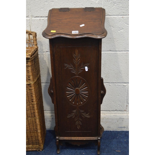 1304 - A FRENCH CARVED OAK BAGUETTE BOX together with a wicker baguette box (2)