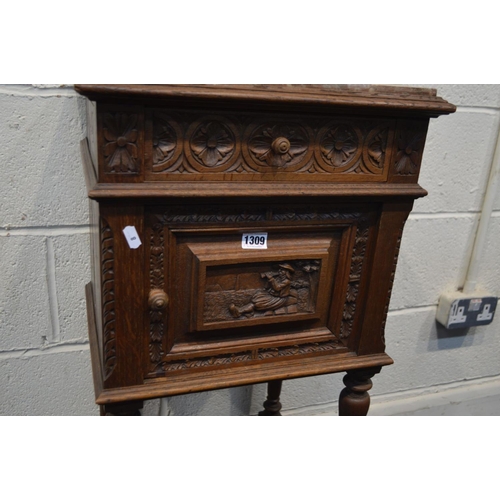 1309 - AN EARLY 20TH CENTURY CARVED OAK BRETON POT CUPBOARD, with a veined marble top, and single drawer an... 