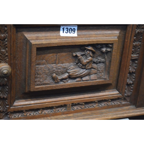 1309 - AN EARLY 20TH CENTURY CARVED OAK BRETON POT CUPBOARD, with a veined marble top, and single drawer an... 