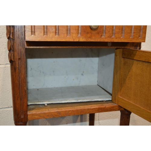 1311 - AN EARLY 20TH CENTURY OAK POT CUPBOARD, with white veined marble top, single drawer and ceramic inte... 