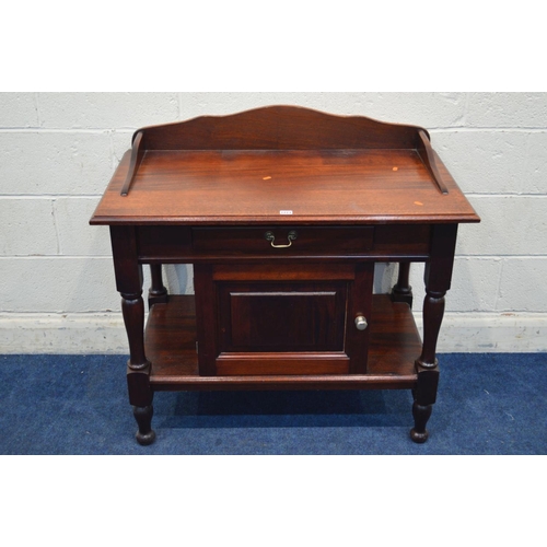 1320 - A MODERN HARDWOOD WASHSTAND with raised back and sides, dummy drawer and a single cupboard door, wid... 