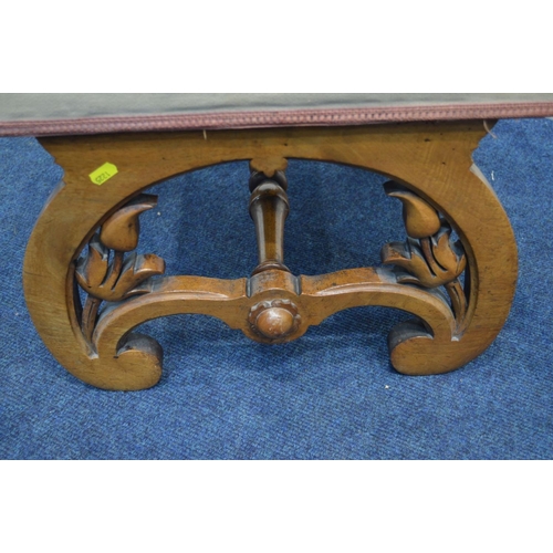 1321 - A LATE VICTORIAN WALNUT CROSS FRAMED FOOTSTOOL with needlework top, 52cm squared x height 41cm