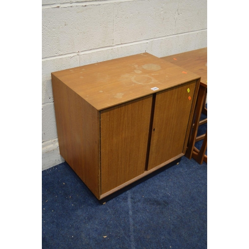 1322 - A MID 20TH CENTURY TEAK TWO DOOR RECORD CABINET together with a teak nest of three tables (sd to fin... 